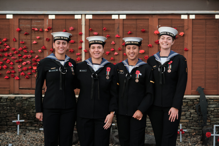 Three women standing together