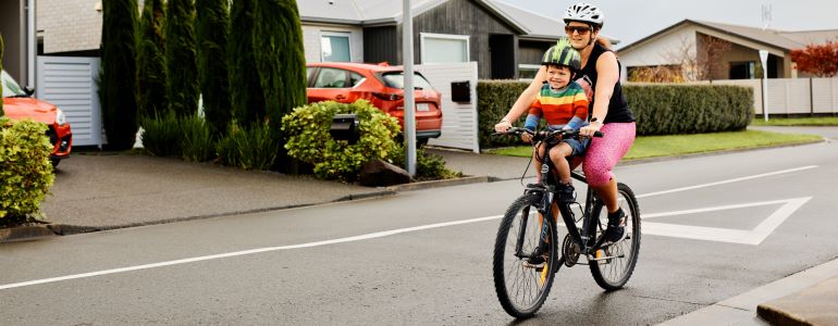 Mum cycling with toddler Mum cycling with toddler