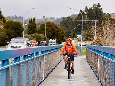 Cyclists will cross the Wairoa Bridge and go under it to cycle up the other side of SH2 Cyclists will cross the Wairoa Bridge and go under it to cycle up the other side of SH2